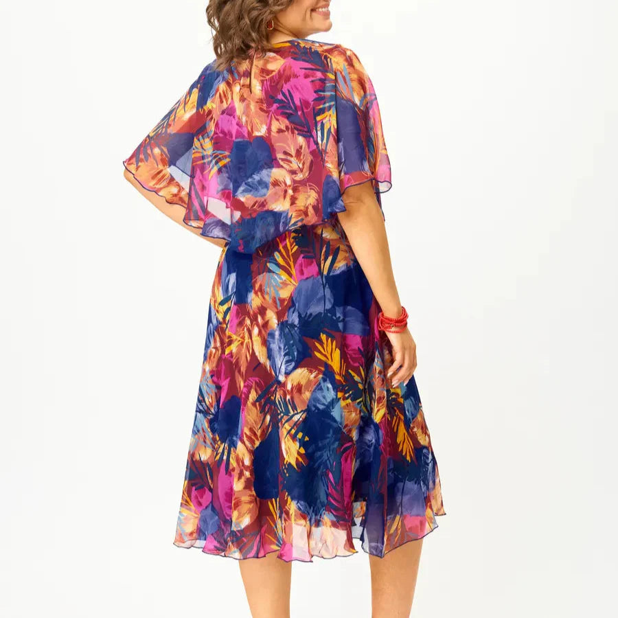Women's plus size chiffon dress with all-over print and layered flowing silhouette