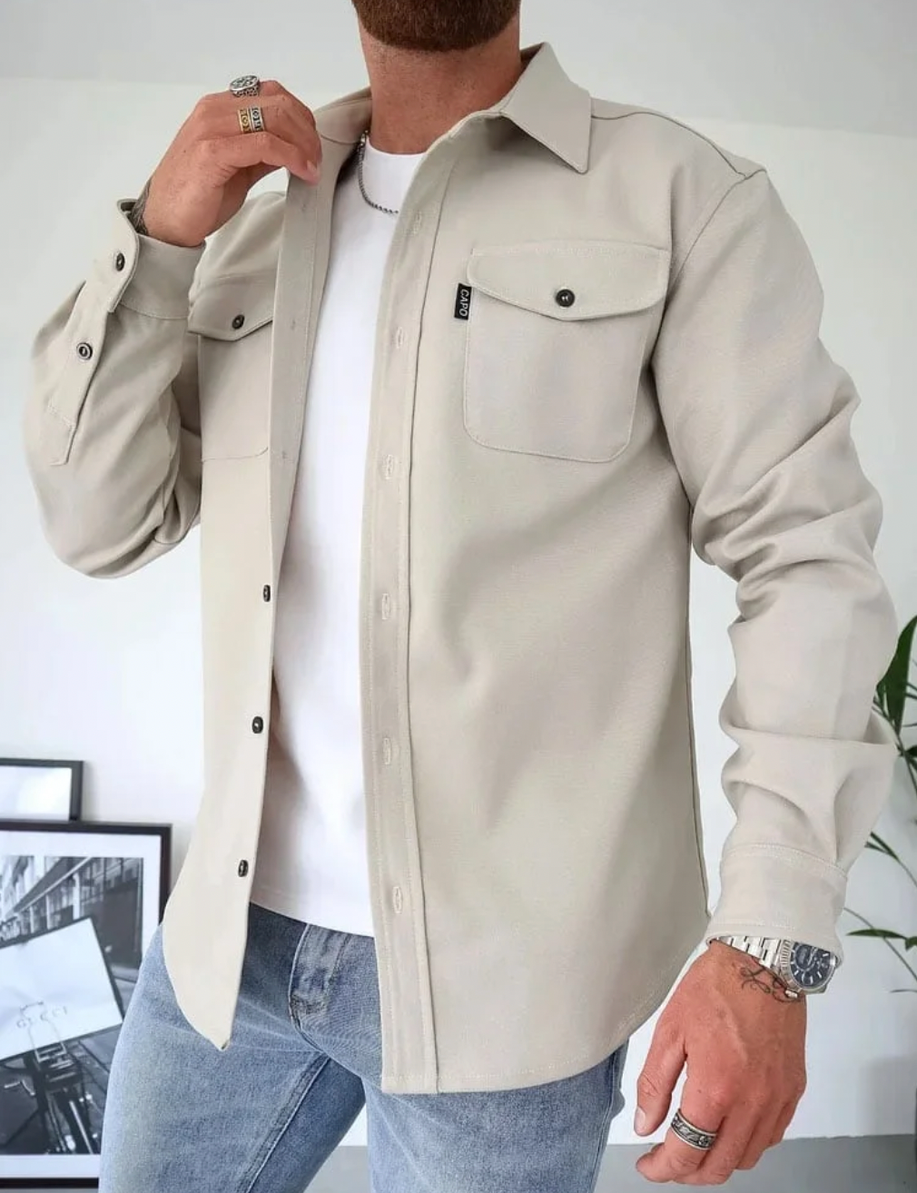 Men's regular fit overshirt with front button closure, flap chest pockets, and straight hem