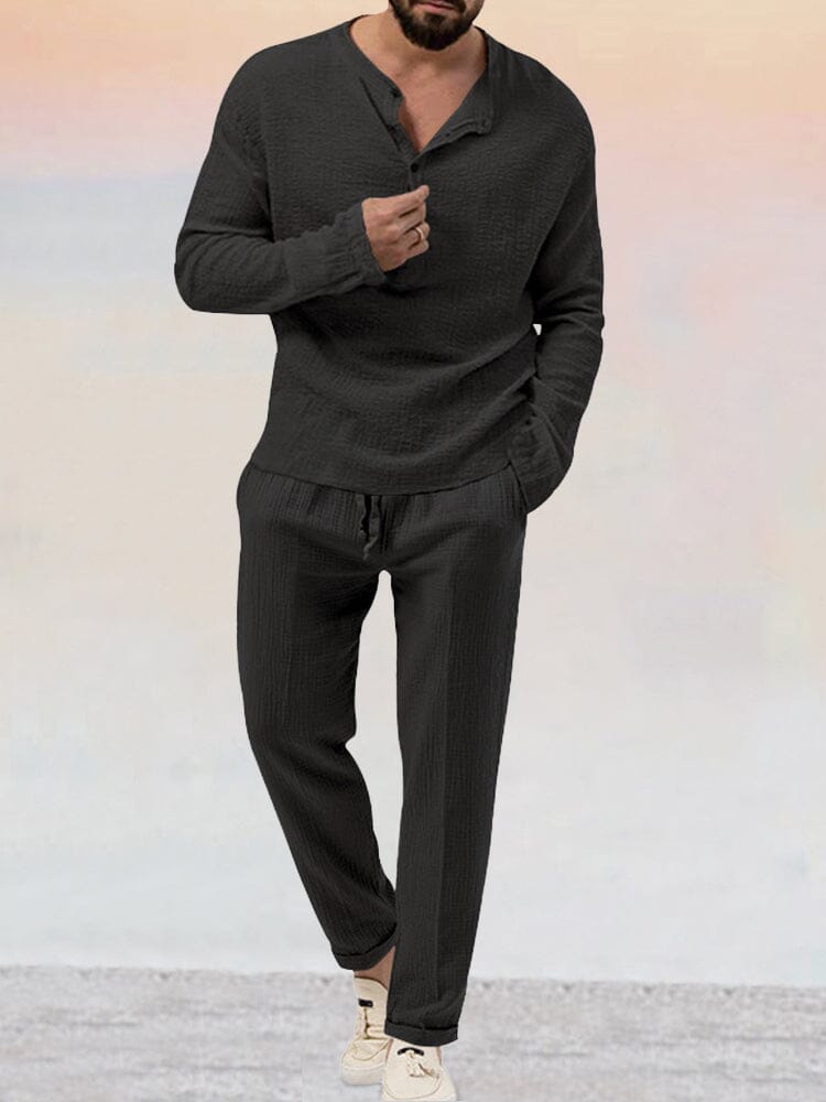 Two-piece men's lounge set with long-sleeve shirt and matching trousers, side profile view