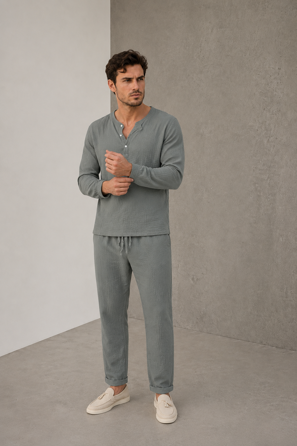 Men's grey two-piece textured lounge set with long-sleeved Henley shirt and trousers