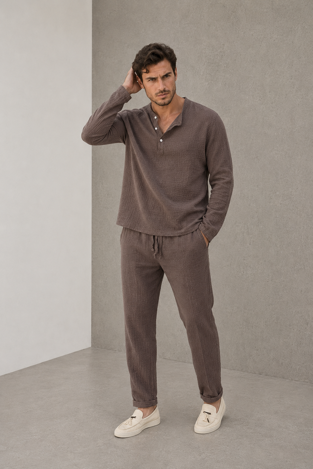 Men's brown two-piece textured lounge set with long-sleeved Henley shirt and trousers