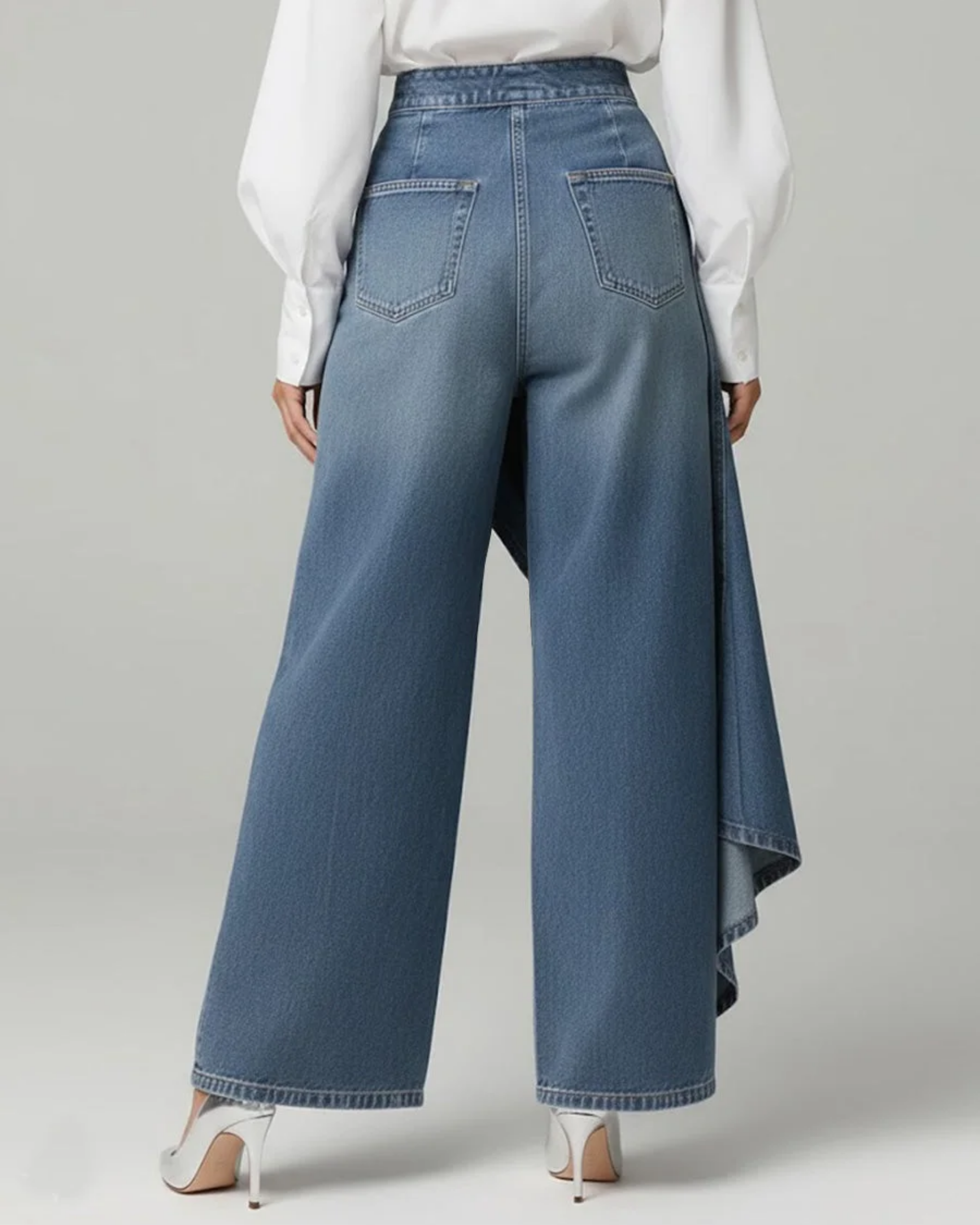 Women's asymmetrical denim wrap pants with layered front and wide-fit silhouette