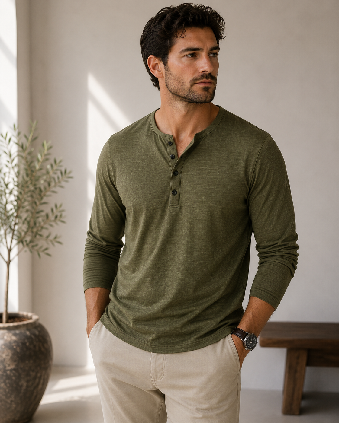 Men's slim fit Henley shirt, three-quarter side view showing sleeve and body silhouette