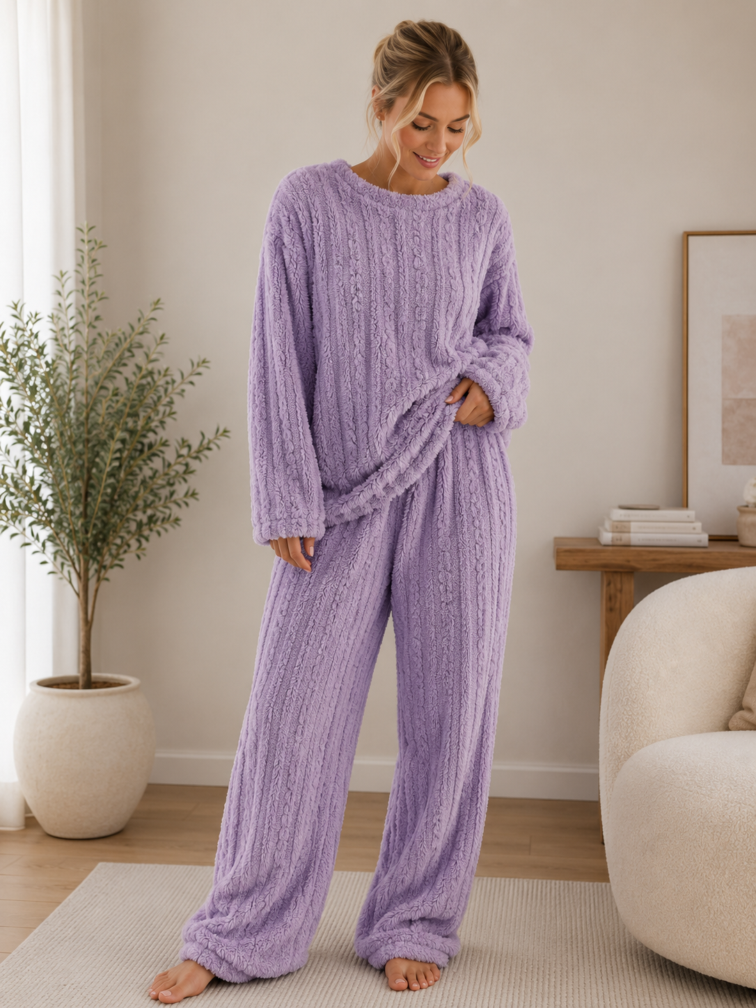 Women's two-piece lounge set with a long-sleeved sweater and matching elastic-waist trousers in a relaxed fit