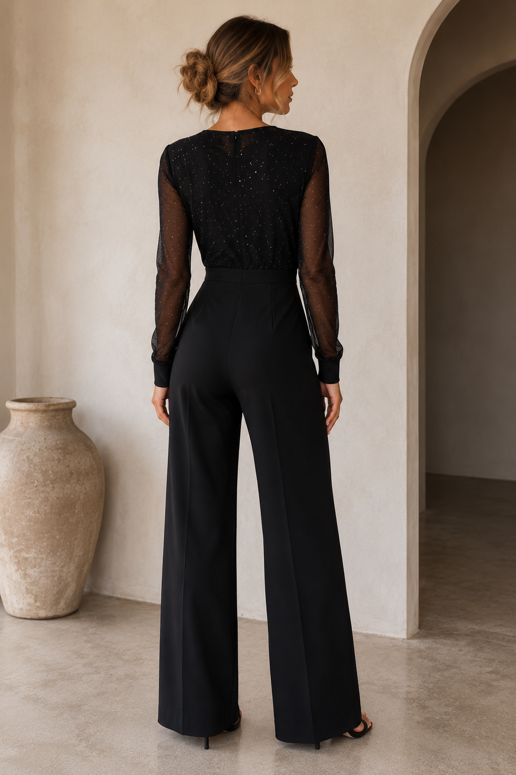 Women's woven jumpsuit with sheer mesh long sleeves and wide-leg silhouette