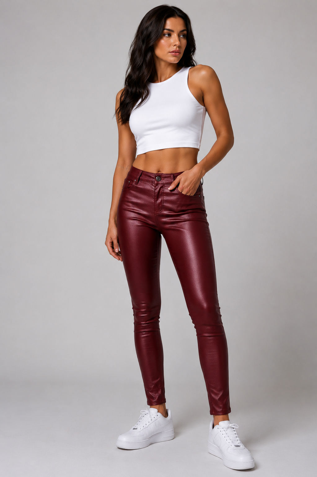 Women's coated trousers in slim-leg cut with uniform surface finish, front view