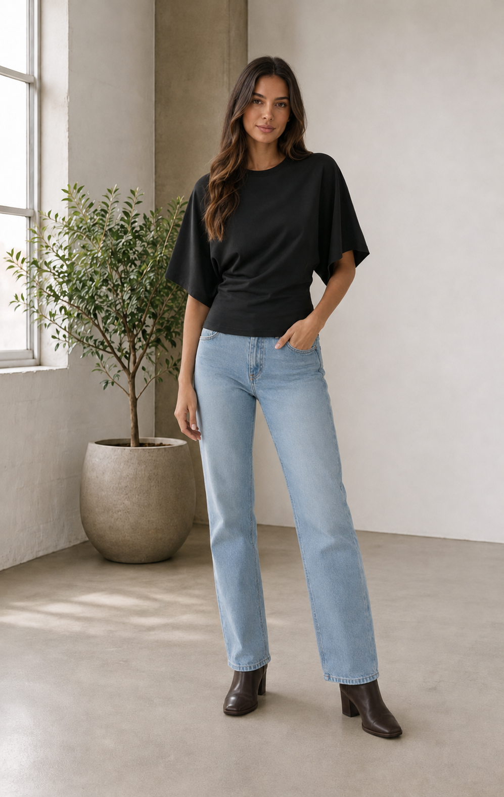 Women's draped cropped top with round neckline and short extended sleeves
