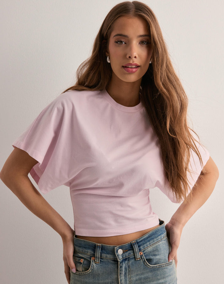 Women's draped short-sleeve top with cropped fit and soft stretch construction