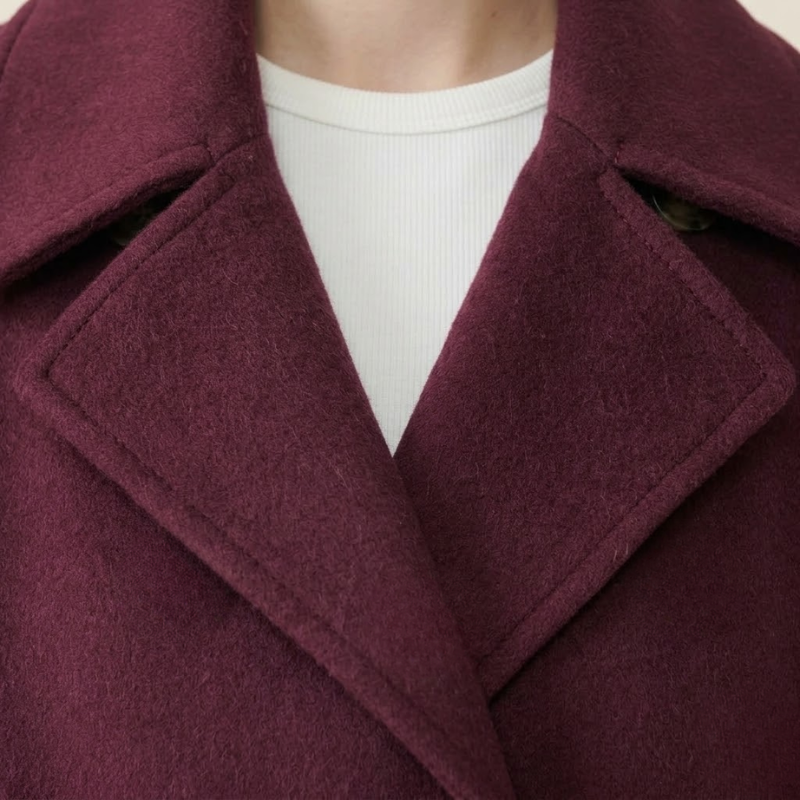 Women's structured short coat with panel construction and straight hem