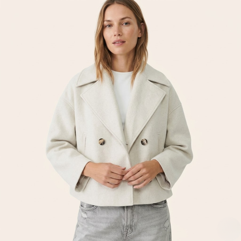 Women's structured short coat with wide lapel collar and double-breasted front