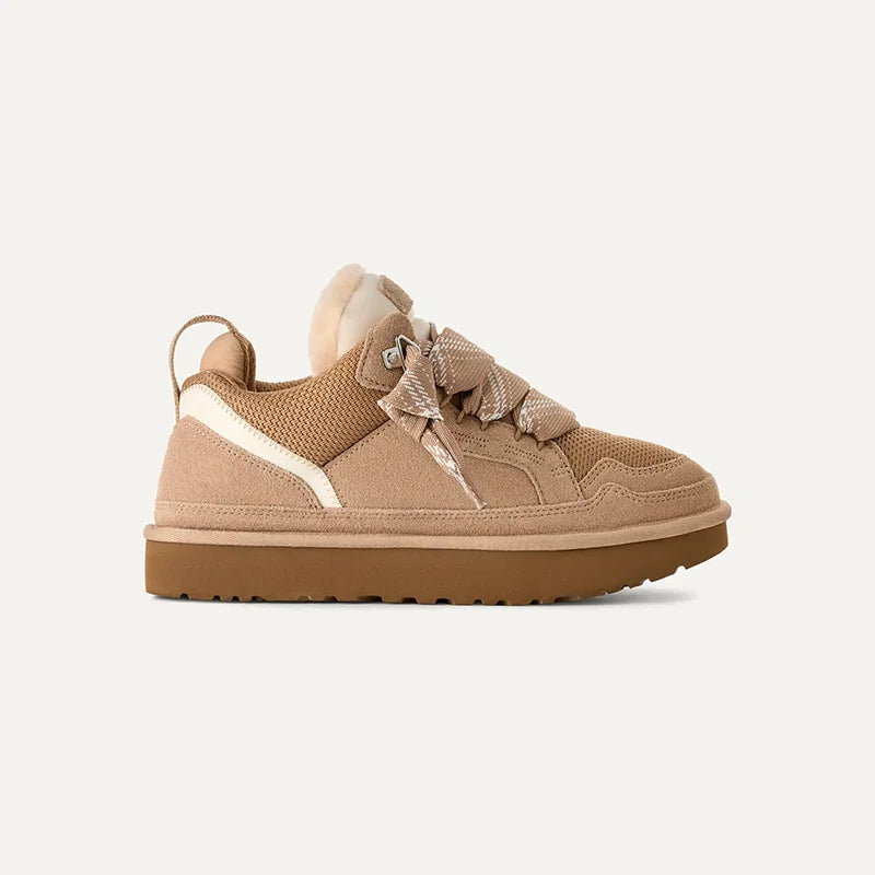 Women's lace-up sneakers with panel seam detailing, padded tongue, and thick grip outsole