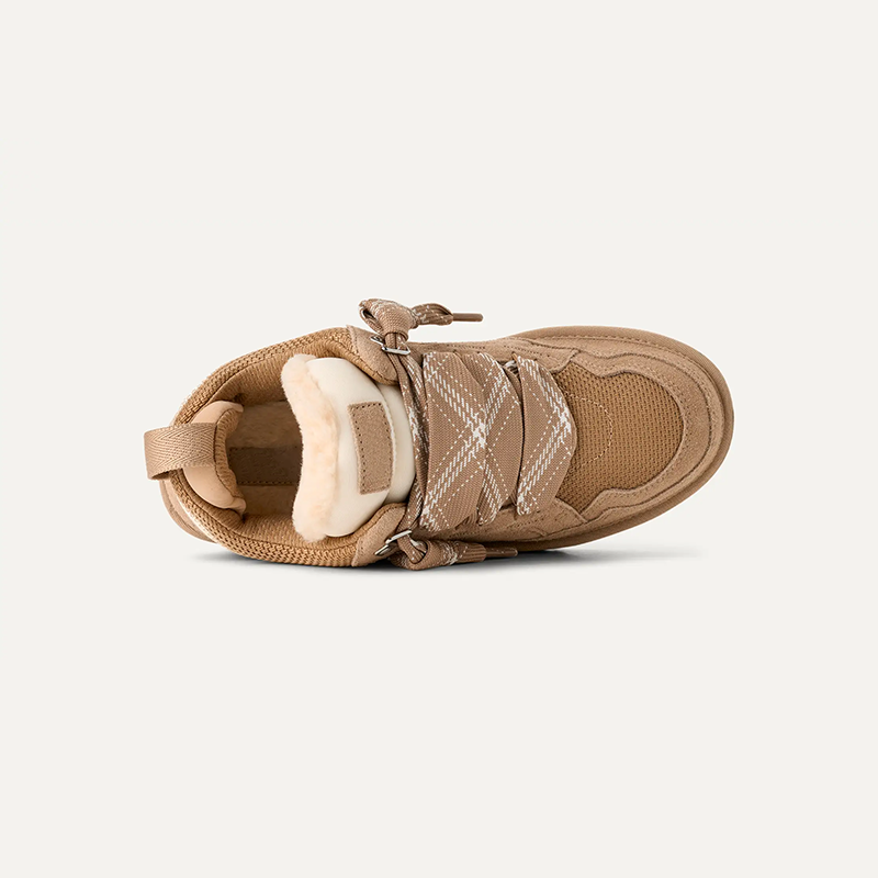 Women's low-silhouette sneakers featuring a back pull tab, layered upper panels, and patterned sole