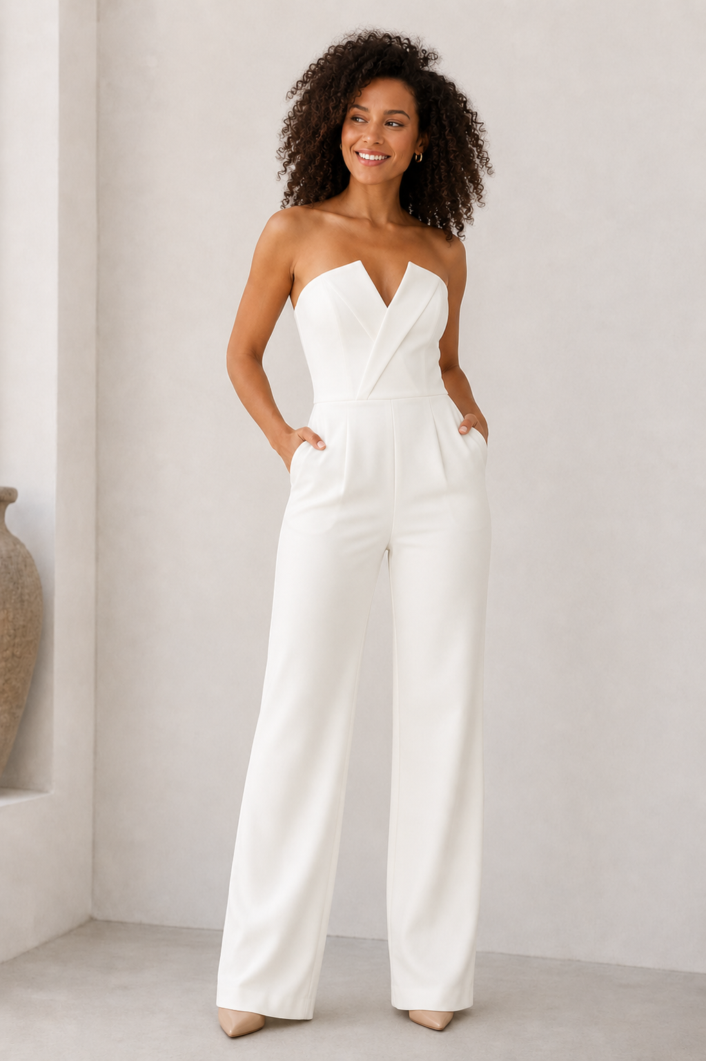 Women's strapless wide-leg jumpsuit with shaped bodice and clean panel construction
