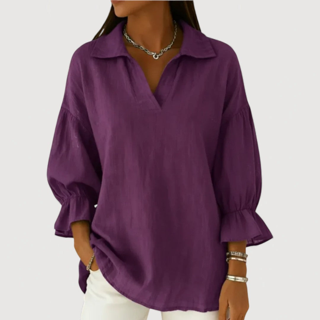 Lightweight women's V-neck blouse with puff sleeves and a flowing silhouette