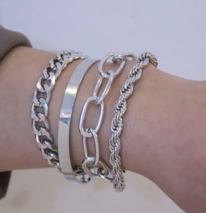 Women's wrist bracelet set with adjustable clasp and layered chain construction