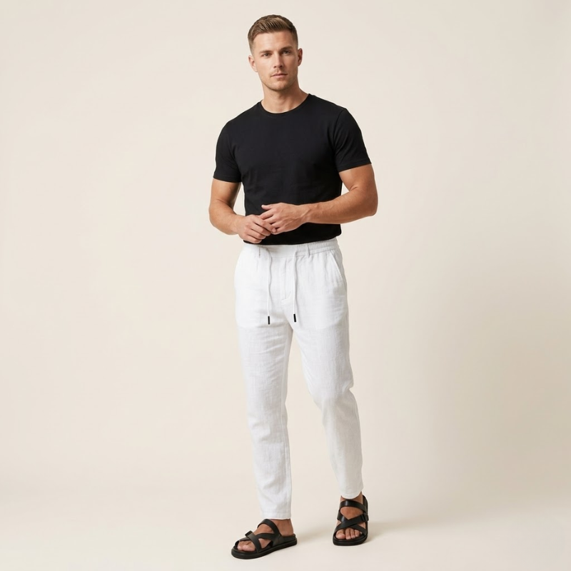 Men's tapered pants in a lighter tone with elastic drawstring waist and tapered leg
