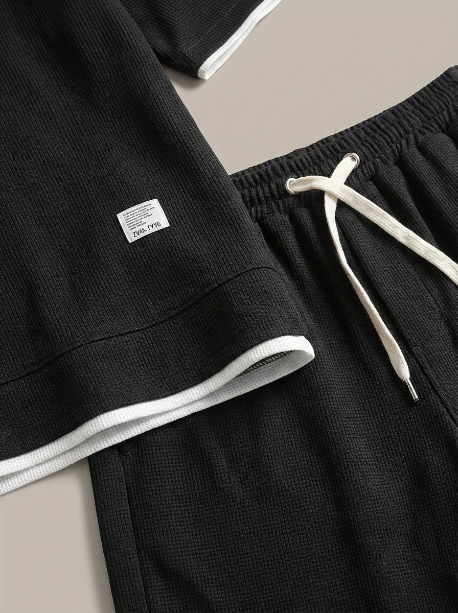 Men's relaxed fit two-piece set with crew neckline tee and knee-length shorts in structured fabric