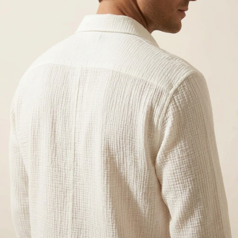 Men's textured button-up shirt with a relaxed silhouette and front button closure