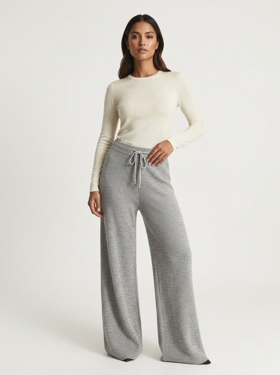 Women's wide-leg knitted pants with elastic drawstring waist, flowing drape and full-length cut