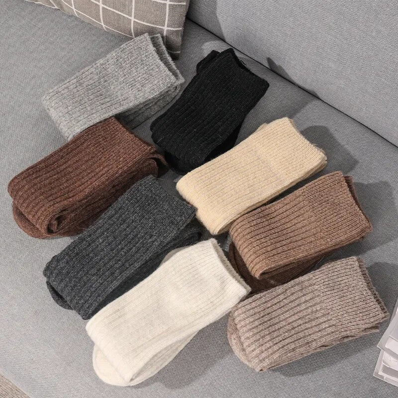 Knitted women's socks with a ribbed shaft, smooth foot, and standard length