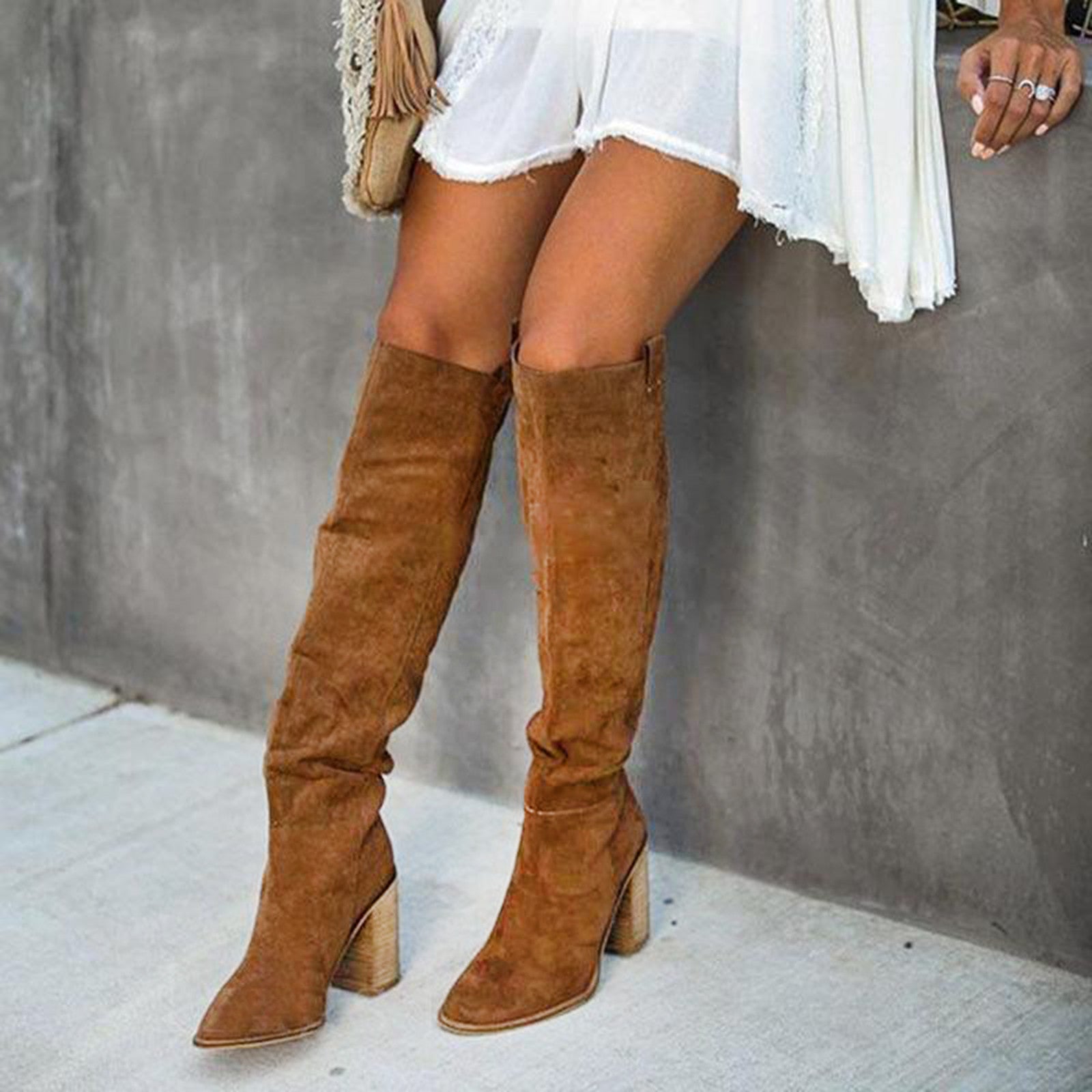 Women's knee-high block heel boots displayed as a pair, top-down view