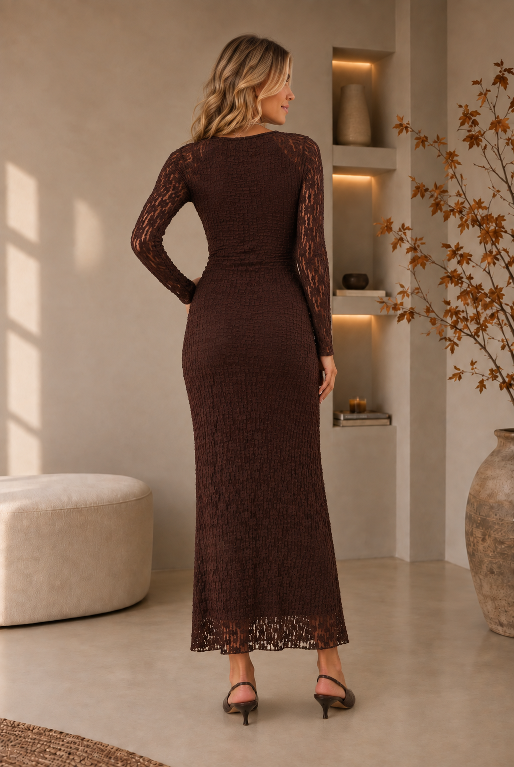 Women's brown lace maxi dress with close-fitting silhouette and sheer lace hem, back view