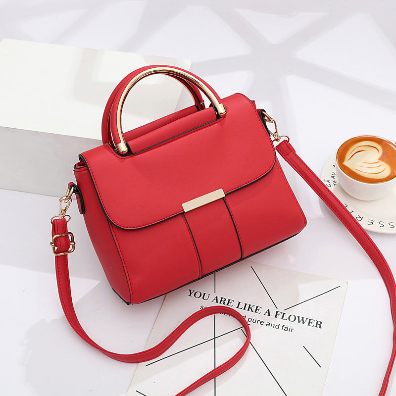 Red elegant shoulder handbag with adjustable strap