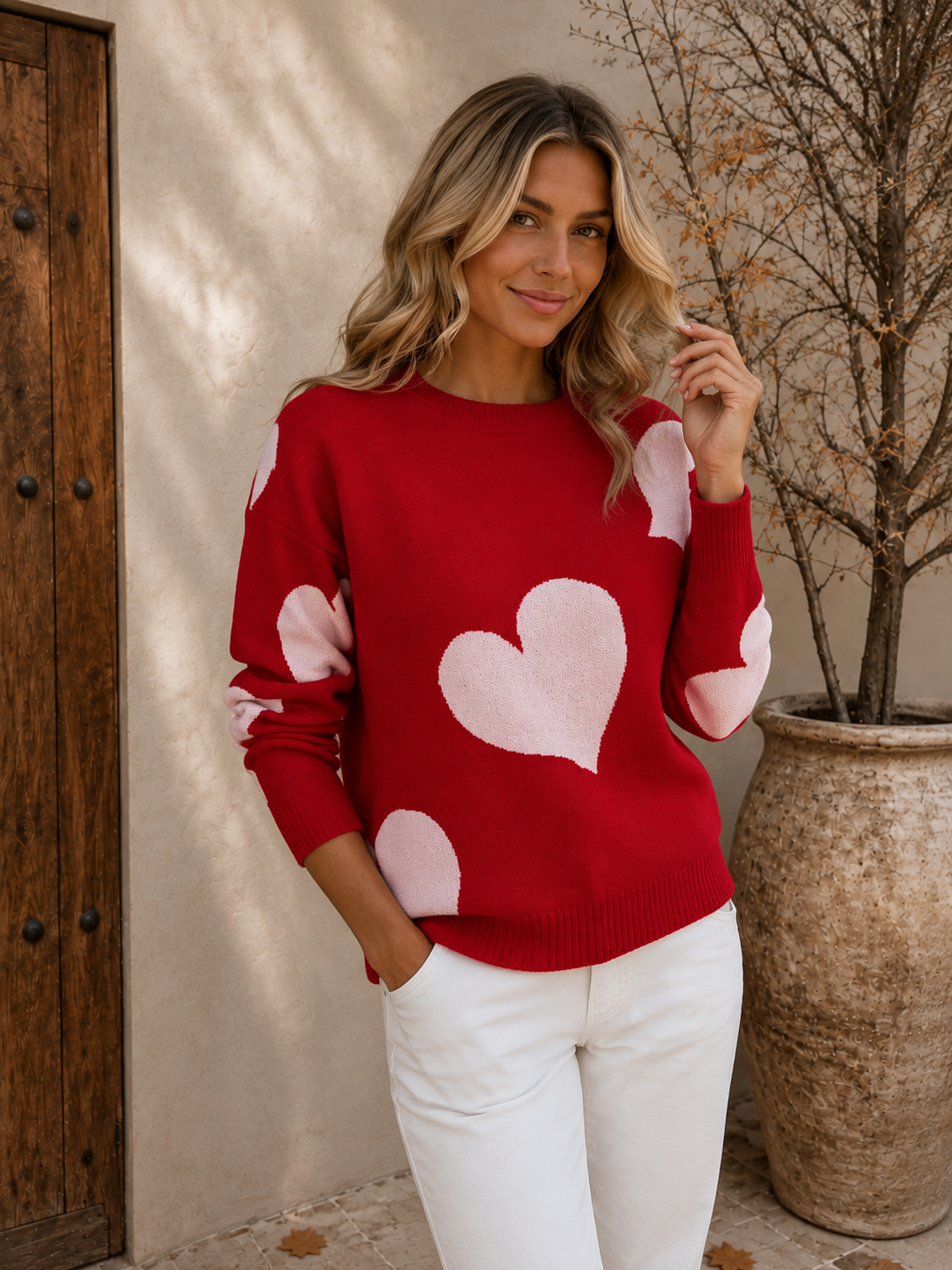 Women's red knitted heart sweater with O-neck and long sleeves
