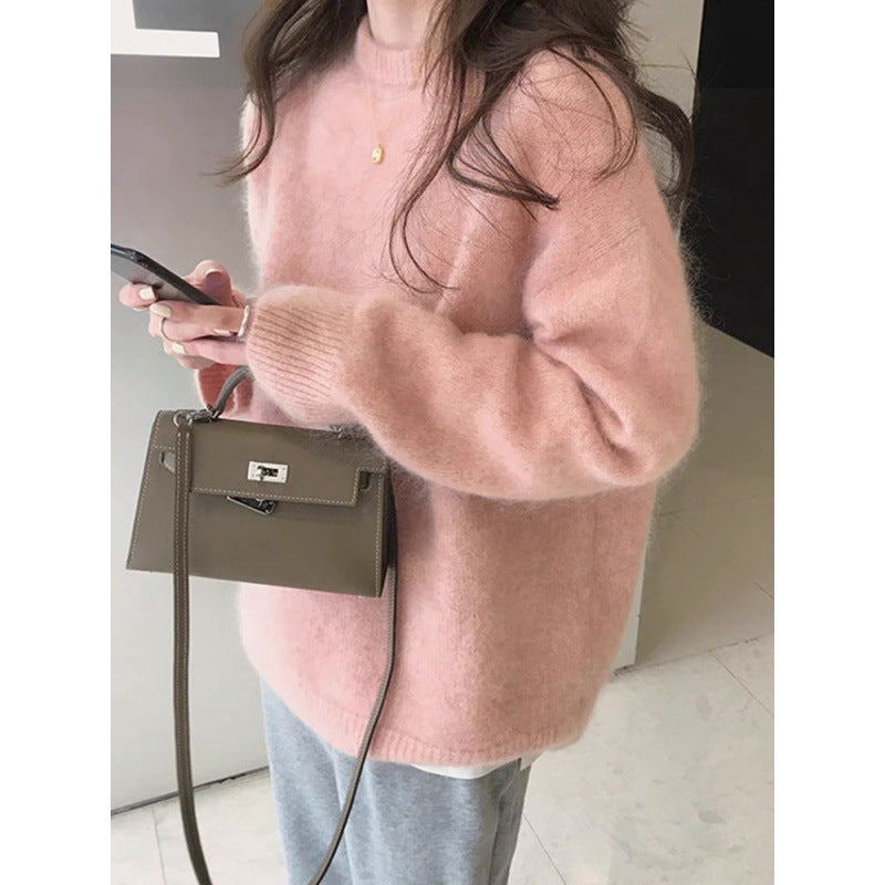 Women's soft fuzzy sweater worn with relaxed everyday styling
