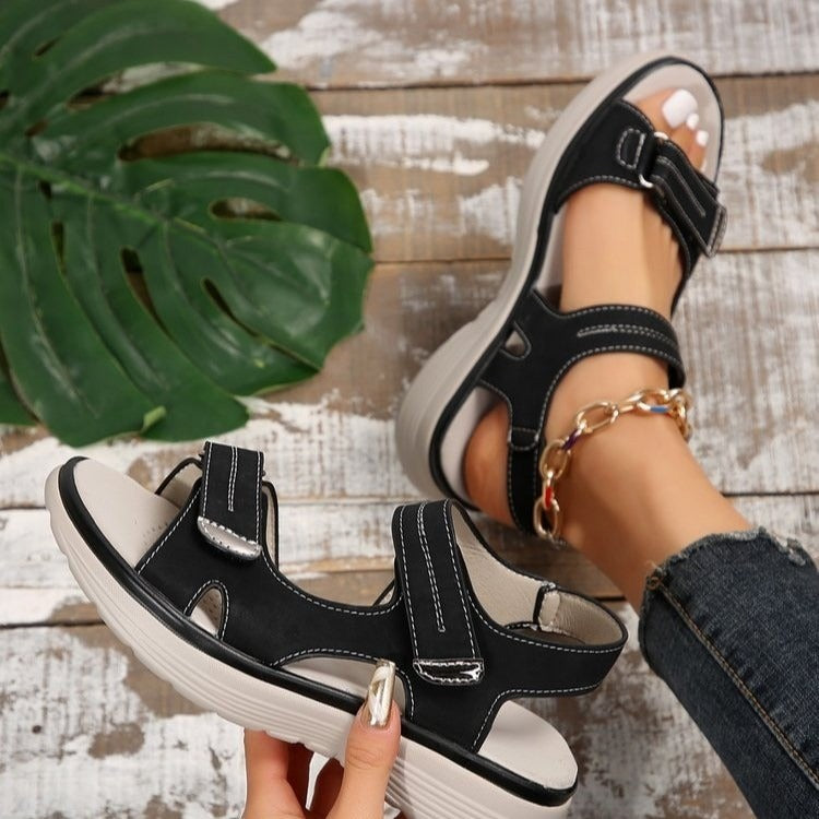 Women's open-toe sandals with Velcro strap closures and flat structured sole