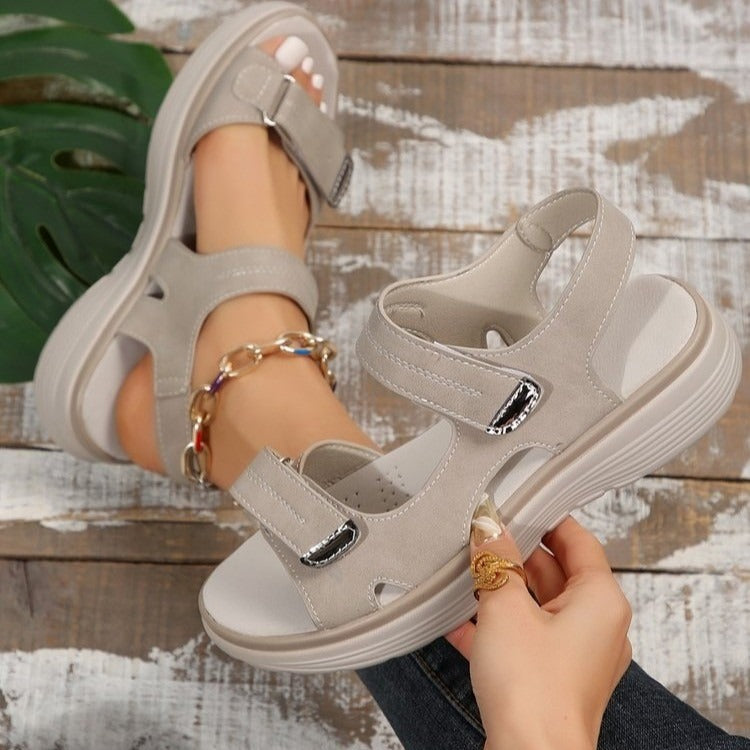 Flat sole women's sandals with multiple adjustable straps and open-toe construction