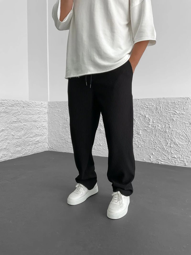 Men's full-length ribbed trousers with drawstring waist and pull-on design