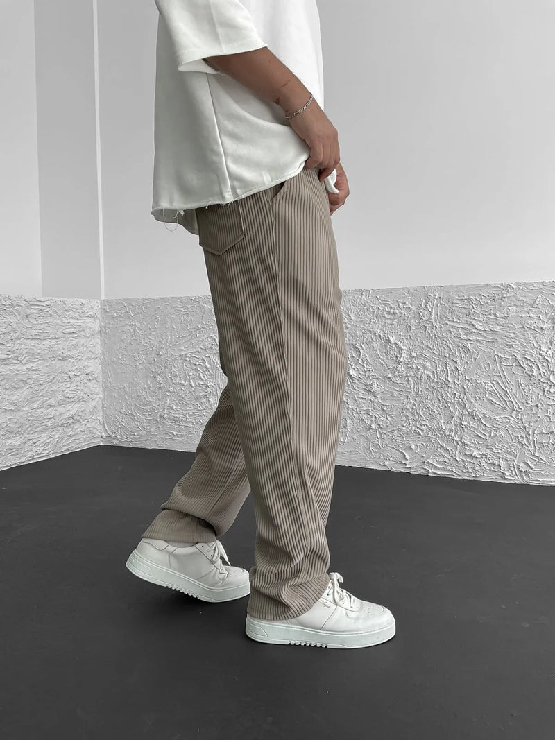 Men's ribbed drawstring trousers with soft textured fabric and relaxed fit