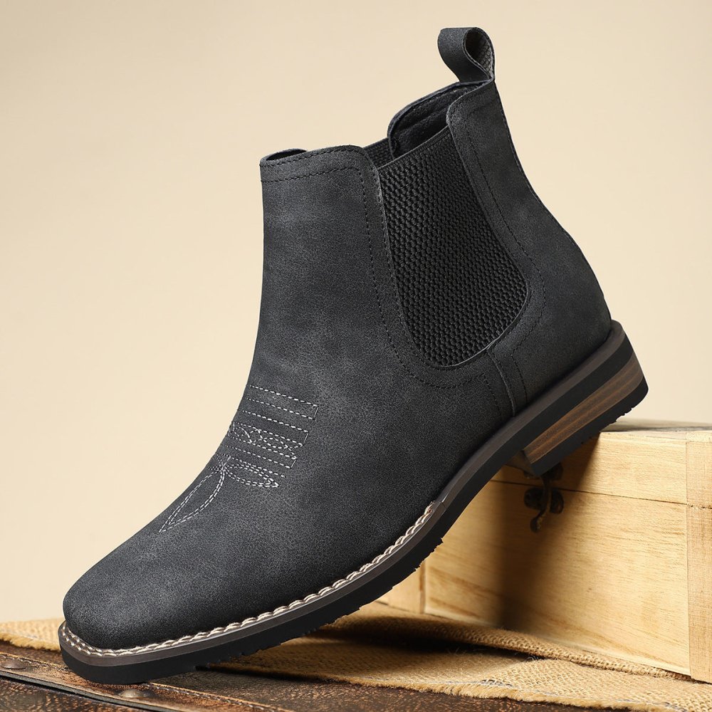 Black synthetic leather Chelsea ankle boots