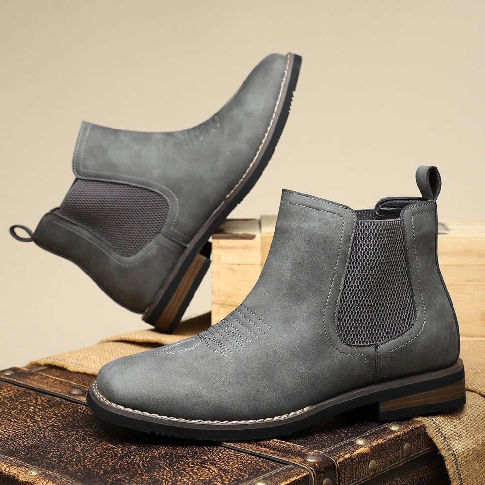 Gray men's Chelsea ankle boots pair