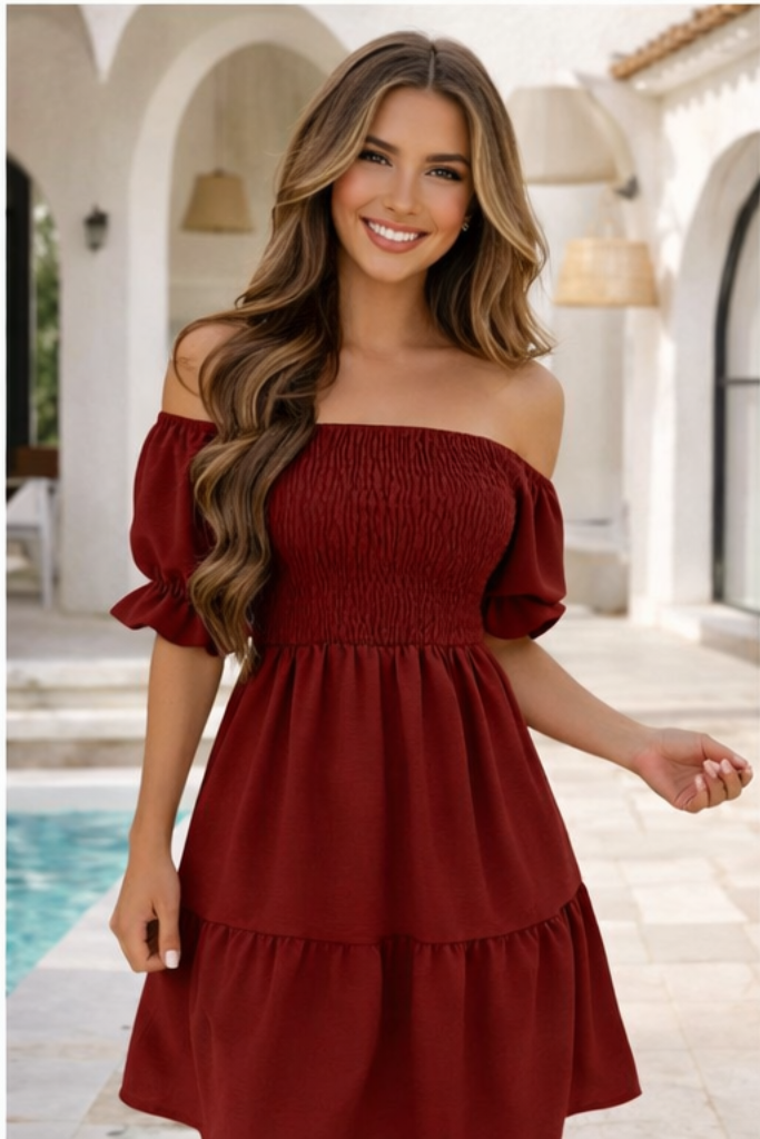 Women's off-shoulder tiered dress with smocked construction, elastic waist, and flared hem