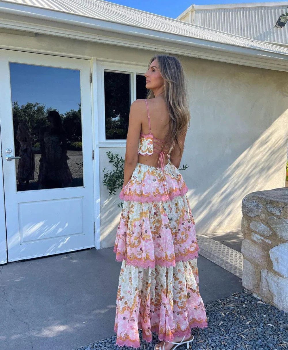 Women's sleeveless maxi dress with gathered ruffle details and figure-hugging bodice