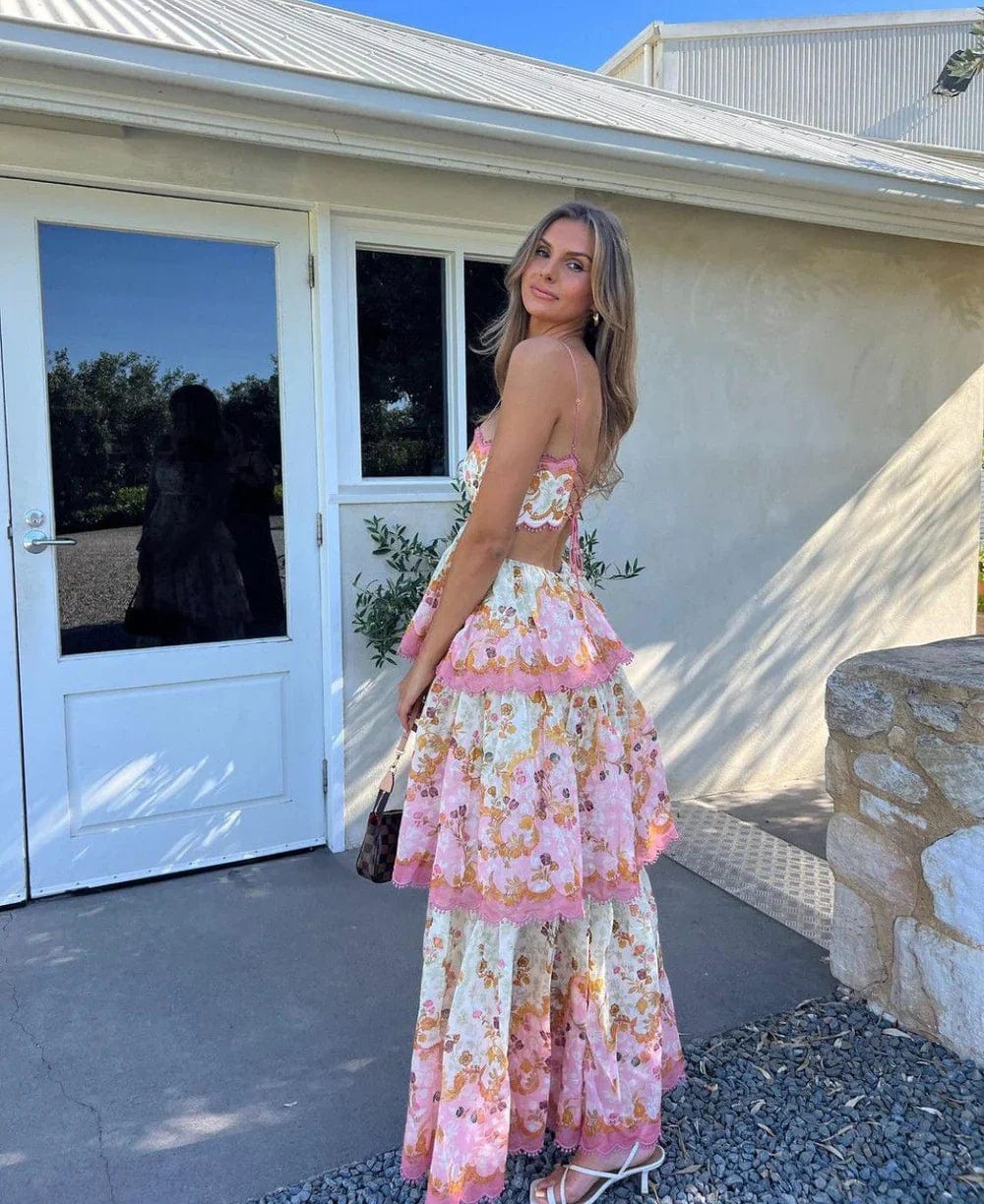 Lightweight semi-transparent maxi dress with flared ruffled hem and straight neckline
