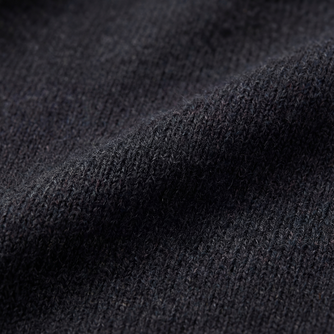 Close-up of gray sweater fabric texture