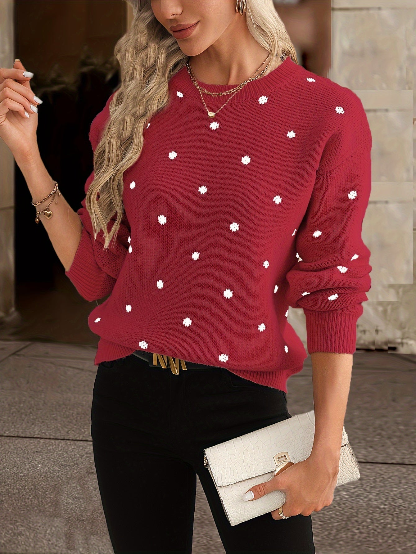 Close-up of dot knit texture on women's patterned sweater