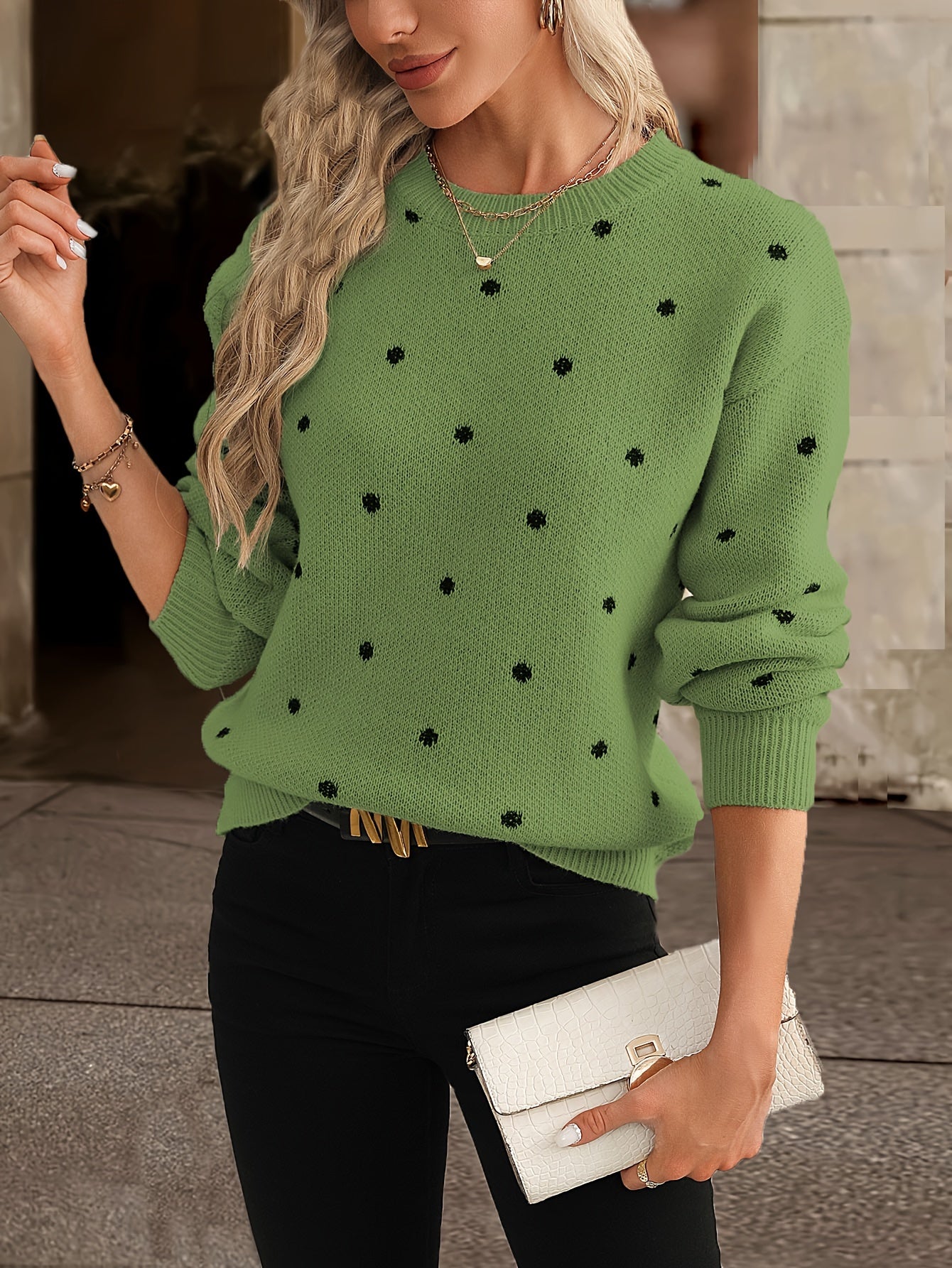 Detail shot of women's patterned knit sweater neckline and fabric texture