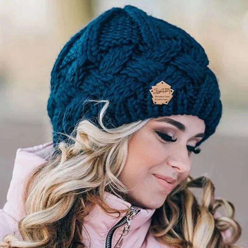 Close-up of women's chunky knit hat showing thick yarn weave and soft texture