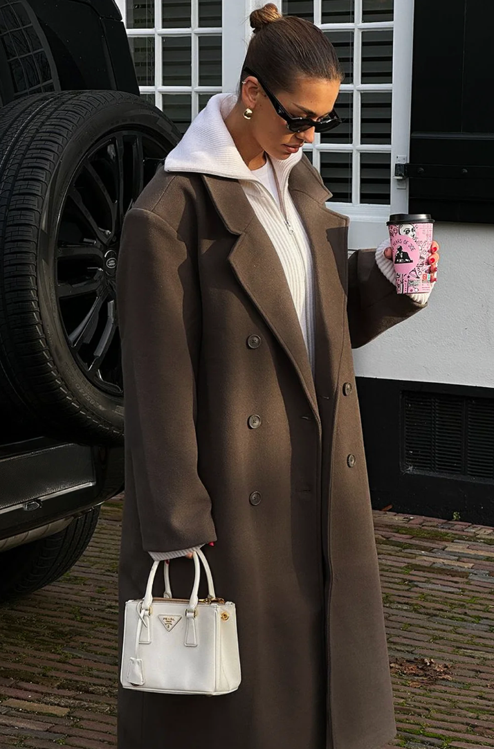 Women's long double-breasted wool blend coat with lapel collar, front view