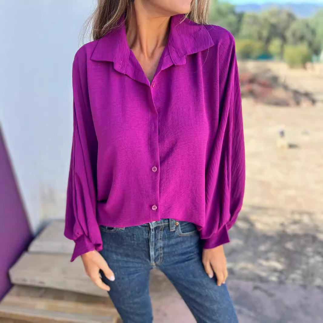 Women's casual button-up blouse with a soft collar and relaxed everyday styling