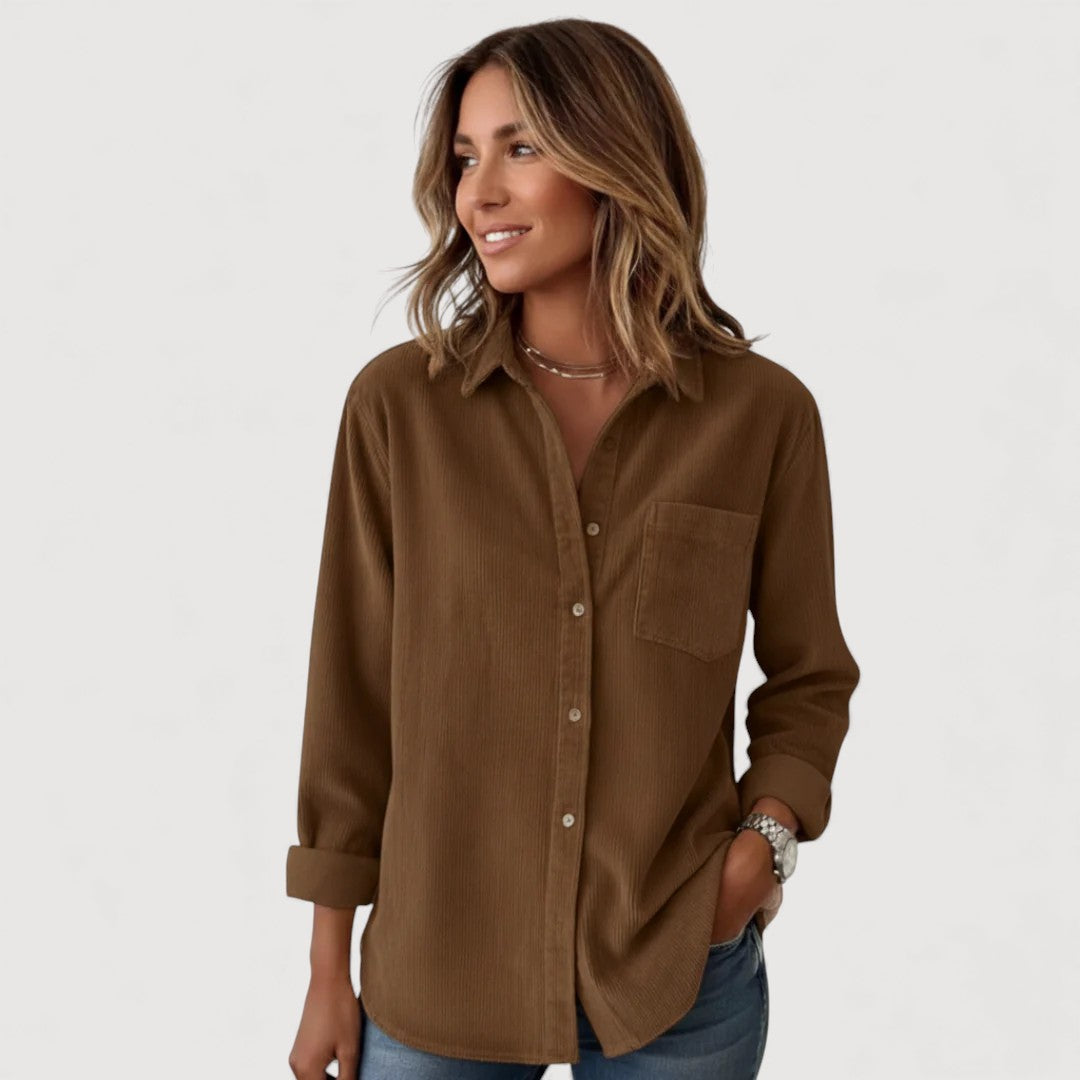 Women's relaxed fit shirt with front buttons, classic collar, and long sleeves