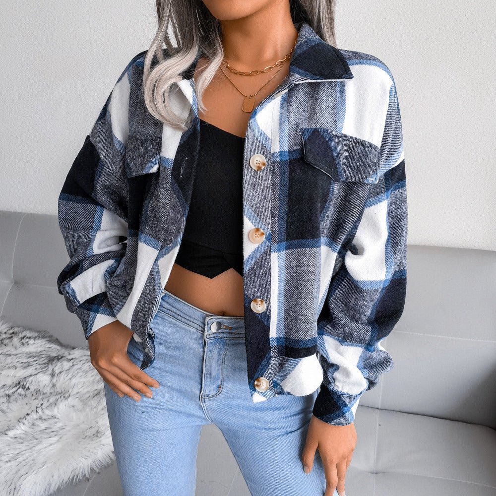 Women's plaid flannel shirt jacket with traditional collar and relaxed silhouette for layering