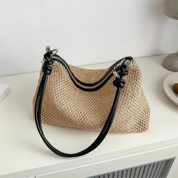 Black braided shoulder bag with long shoulder strap