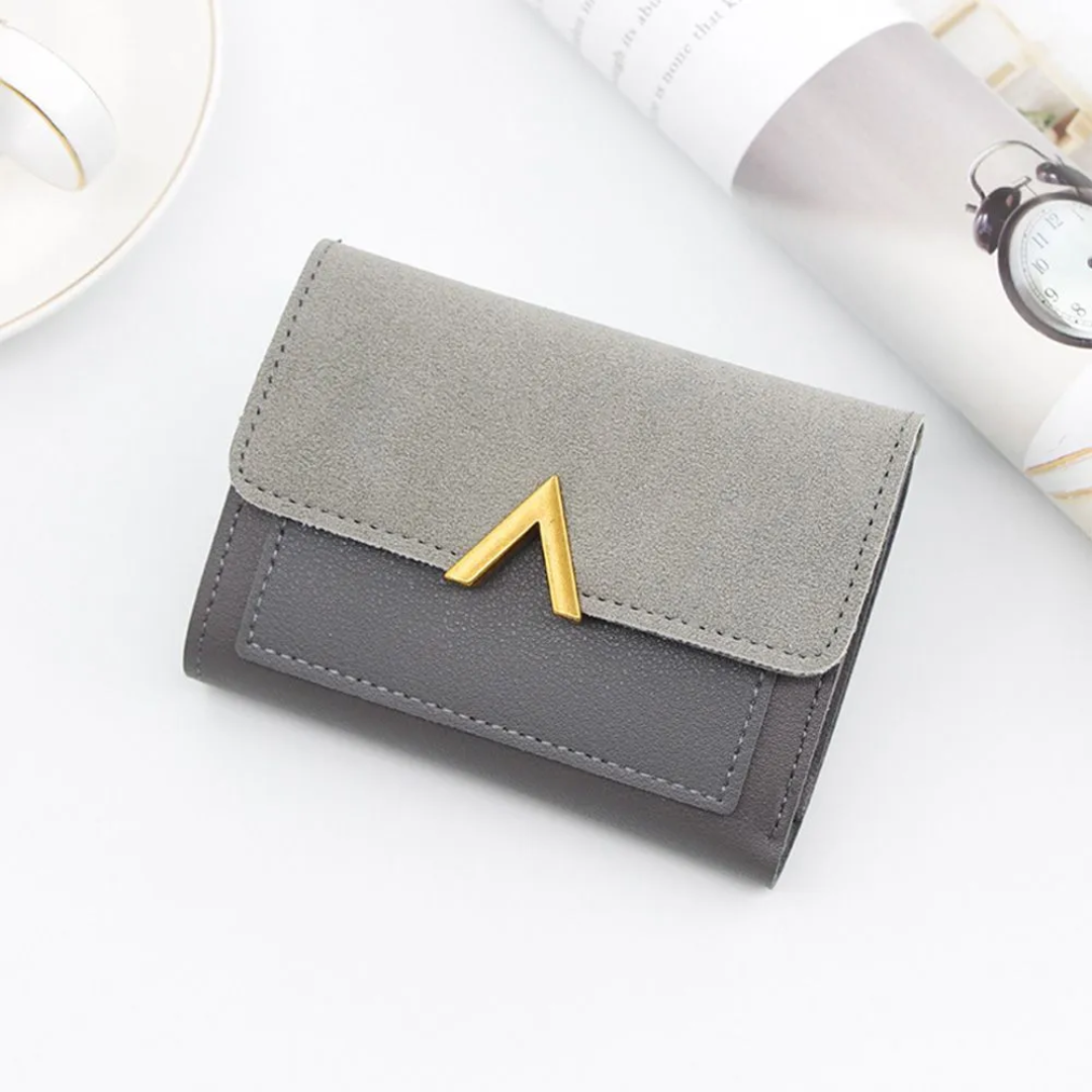 Women's slim faux leather wallet with snap button and multiple card compartments