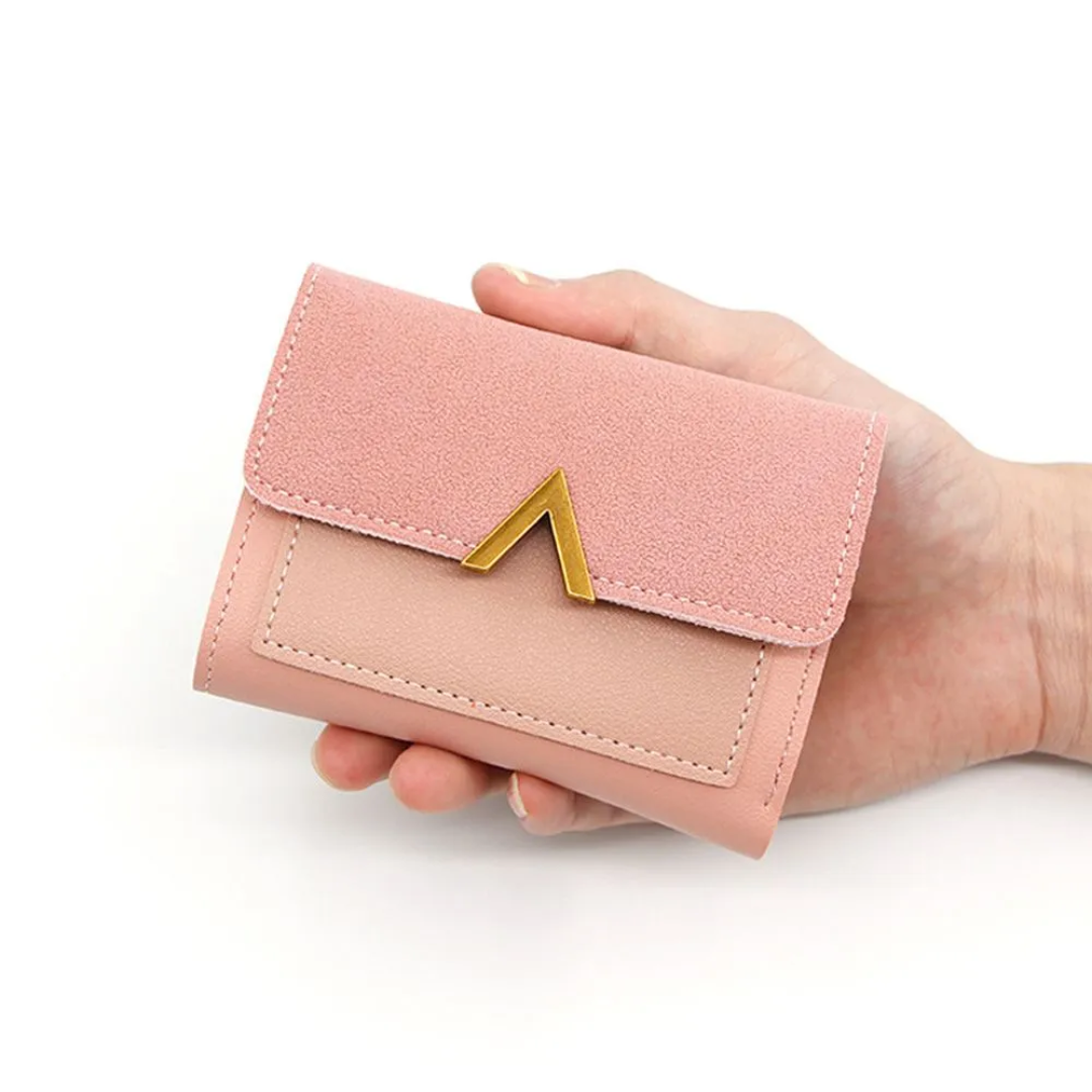 Compact faux leather women's wallet featuring a foldable snap-button design