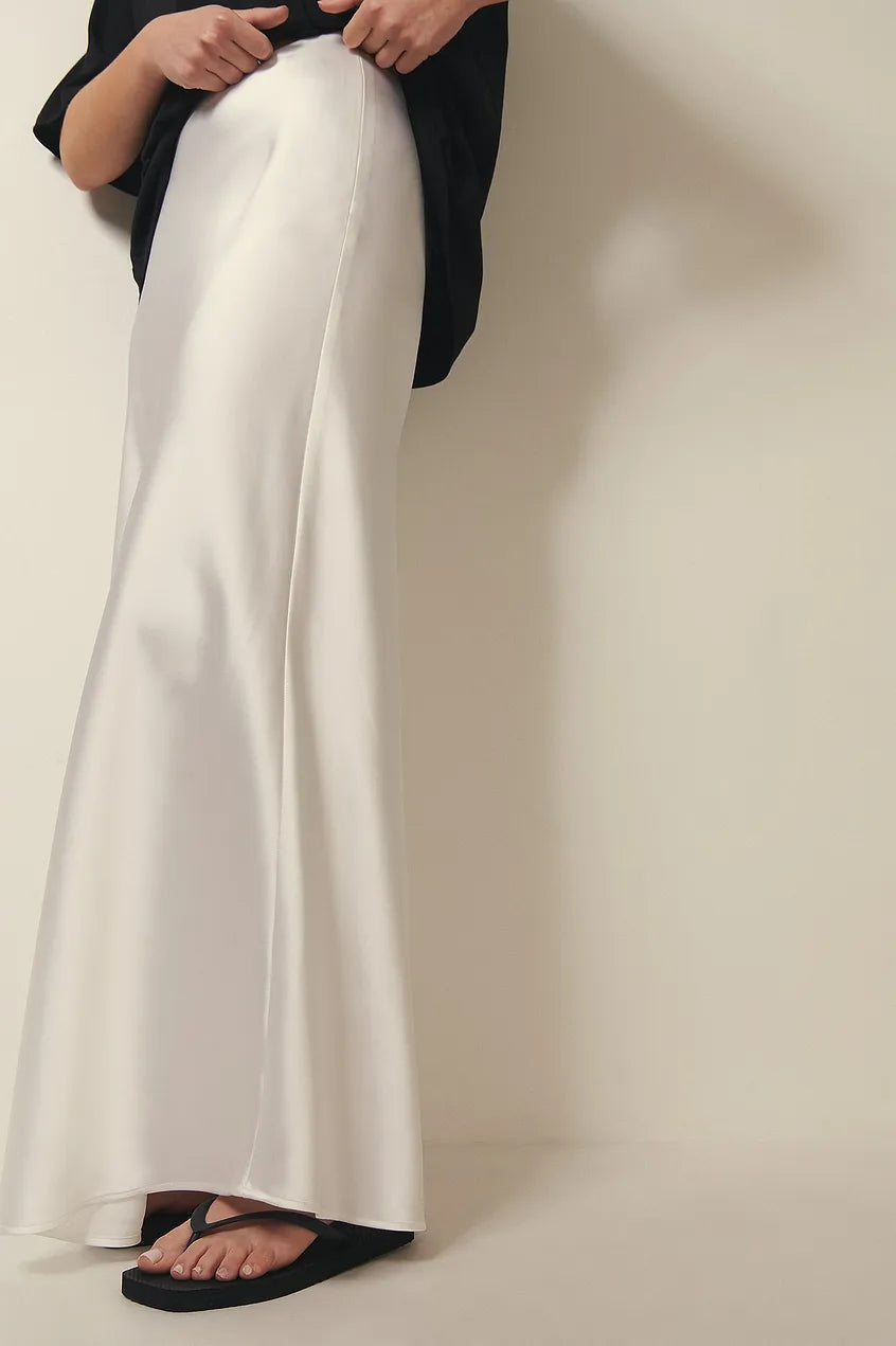 Satin midi skirt for women, side view showing clean lines and midi length